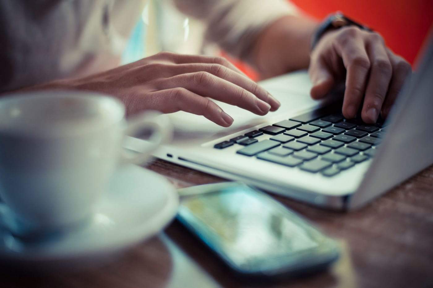 Close up of Gal Jakič typing on a keyboard. © Jure Makovec